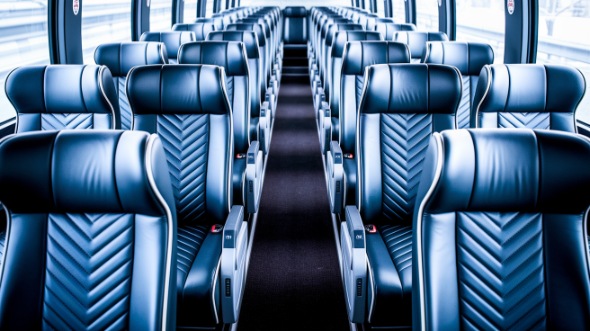 vista 54 passenger charter bus inside