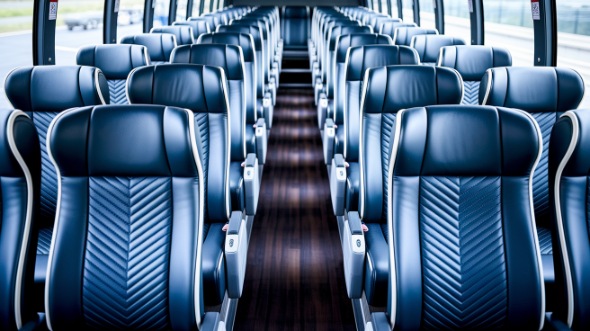 vista 56 passenger charter bus inside